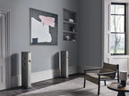 KEF LS60 Wireless floorstanding speakers in titanium grey with sleek modern design, showcasing their elegant speaker cabinets.