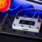 Zoom NEURIG on a pedalboard with guitar and amp